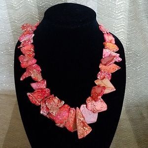 Barse orange sponge coral necklace.